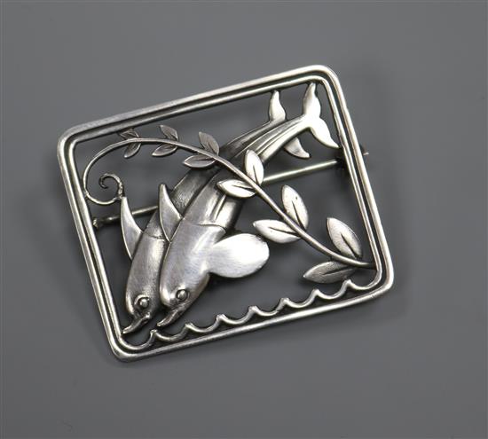 A Danish Georg Jensen sterling silver twin dolphin brooch, no. 251, 37mm.